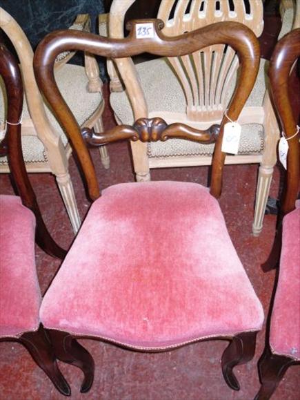 Appraisal: Five matching rosewood framed balloon back chairs