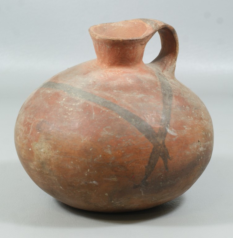 Appraisal: Native American unglazed red pottery jug with black decoration on