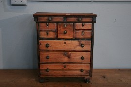 Appraisal: A pine depression miniature cabinet x x cm