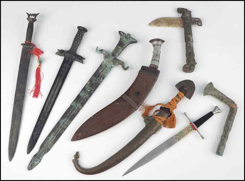 Appraisal: TWO DAGGERS WITH SCABBARDS Together with four swords and two