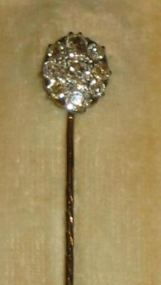 Appraisal: A VICTORIAN DIAMOND STICK PIN comprising old brilliant and cushion