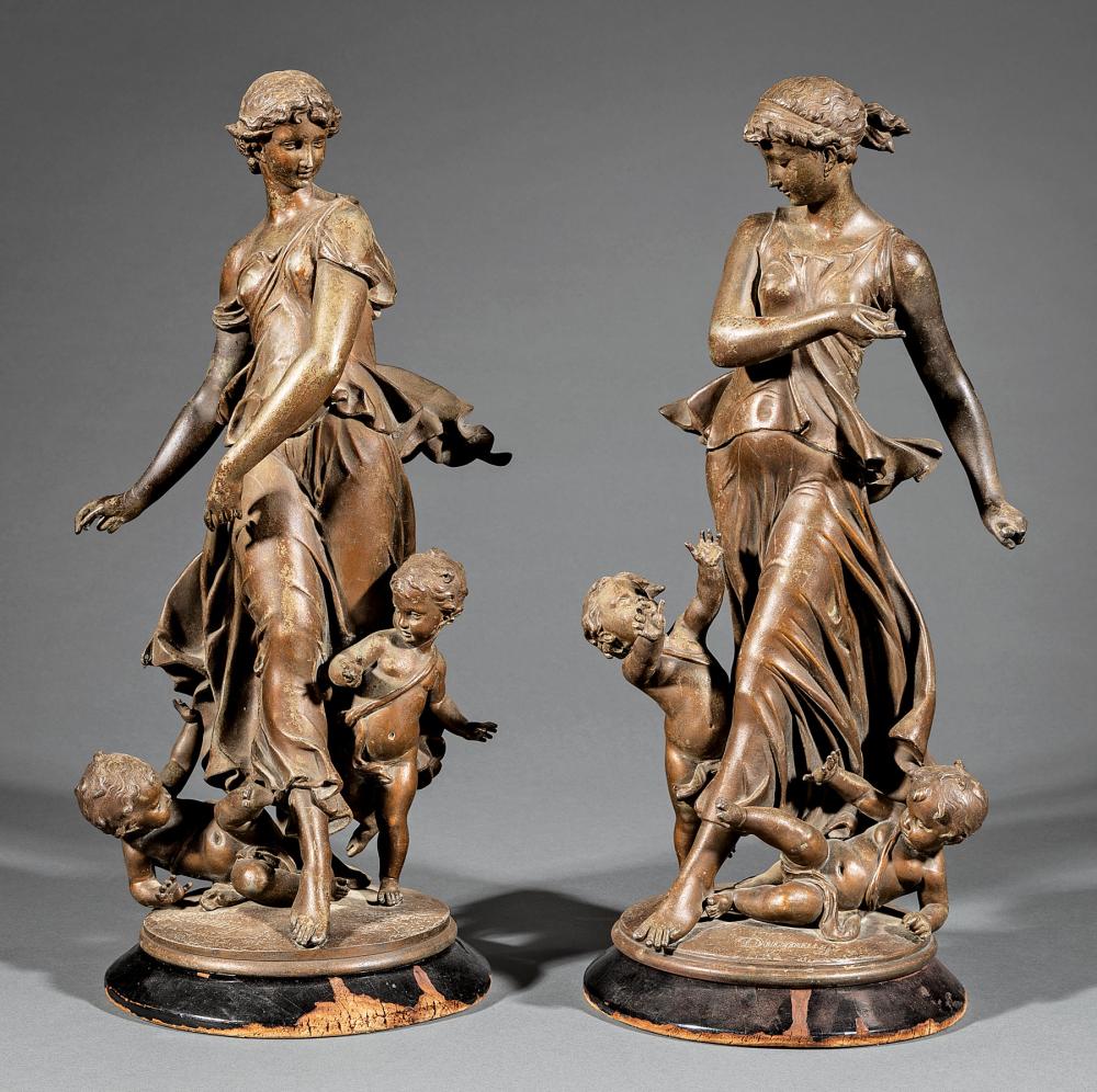 Appraisal: Pair of Patinated Metal Figures of Maidens with Putti after