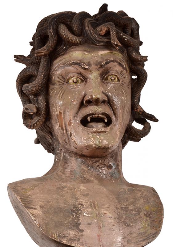 Appraisal: A PAINTED WOOD BUST OF MEDUSA cm high