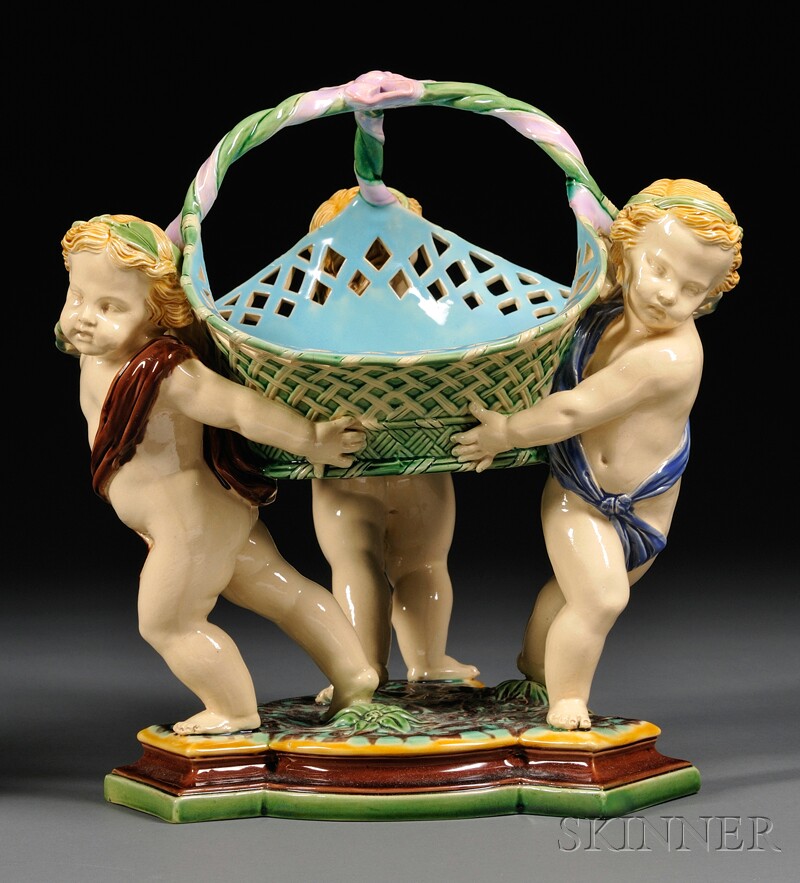 Appraisal: Minton Majolica Centerbowl England date cipher for with three putti