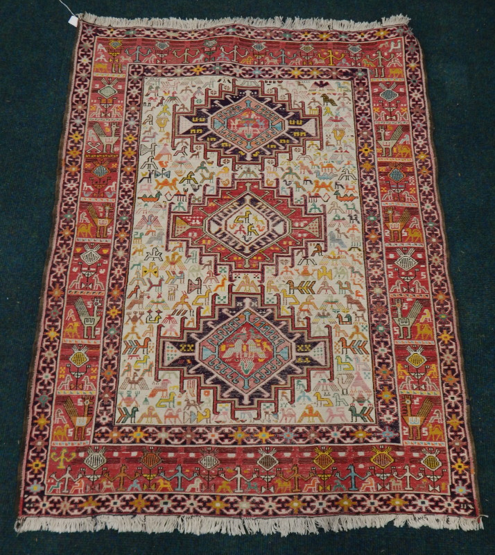 Appraisal: A modern Sumak Kilim flat weave rug decorated with animals