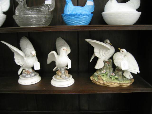 Appraisal: Bisque Figurines of White Doves