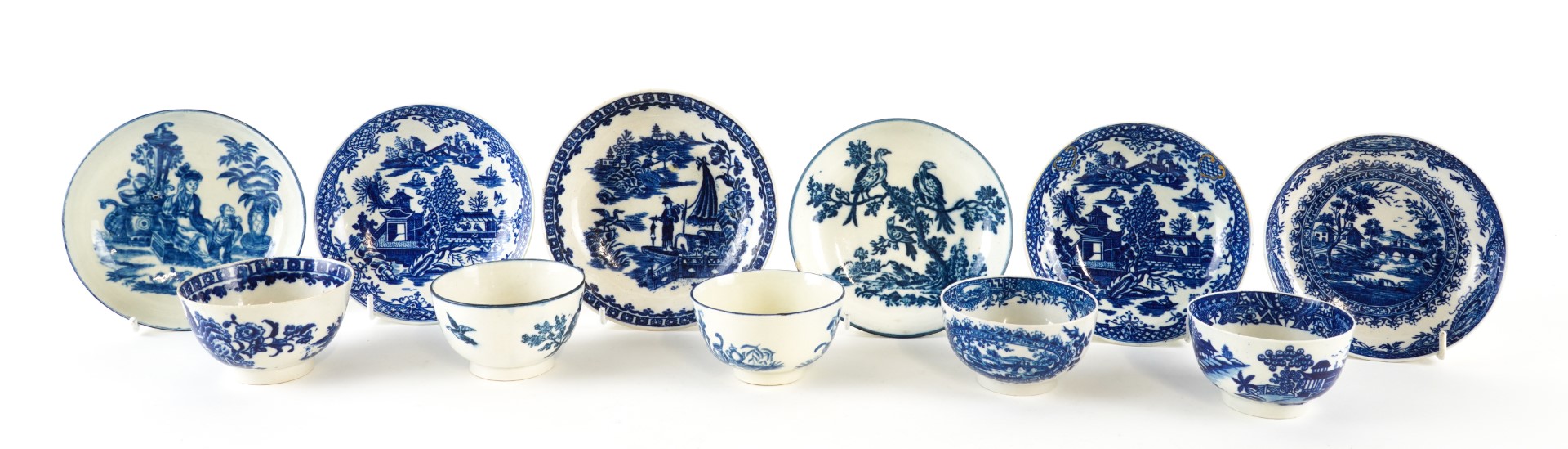 Appraisal: FOUR WORCESTER BLUE AND WHITE TEABOWLS AND SAUCERS Late th