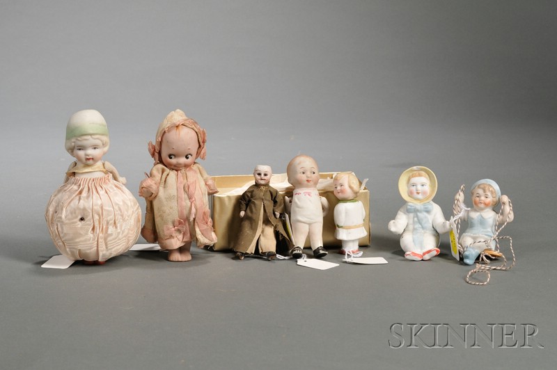 Appraisal: Four Small All-Bisque Dolls and Three Small Bisque Figures late