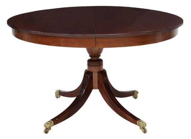 Appraisal: English Sheraton style mahogany extension table th c oval tabletop