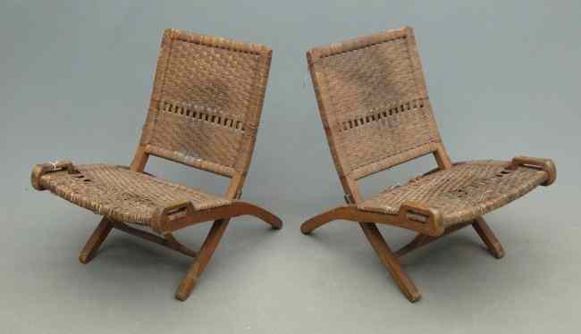 Appraisal: Pair Hans Wegner style Mid Century folding chairs