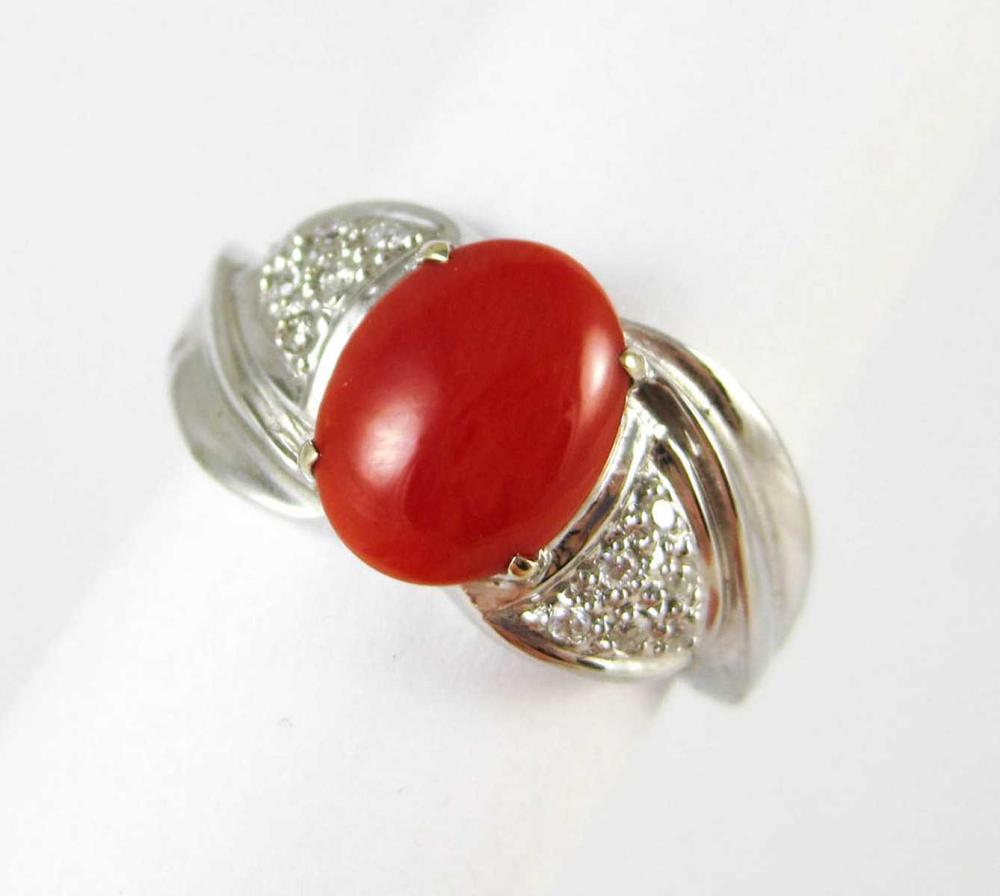 Appraisal: CORAL DIAMOND AND FOURTEEN KARAT WHITE GOLD RING with six