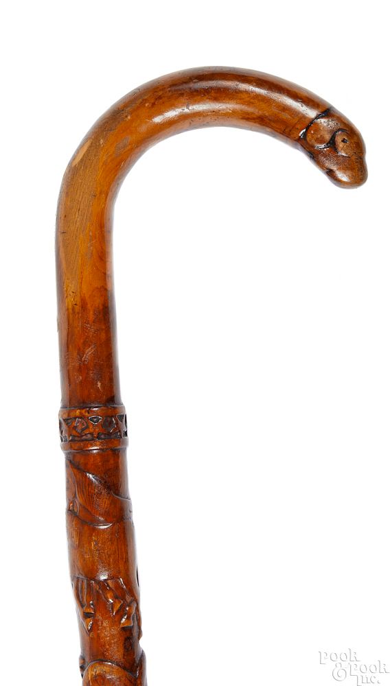 Appraisal: Pennsylvania carved cane Pennsylvania carved cane late th c with