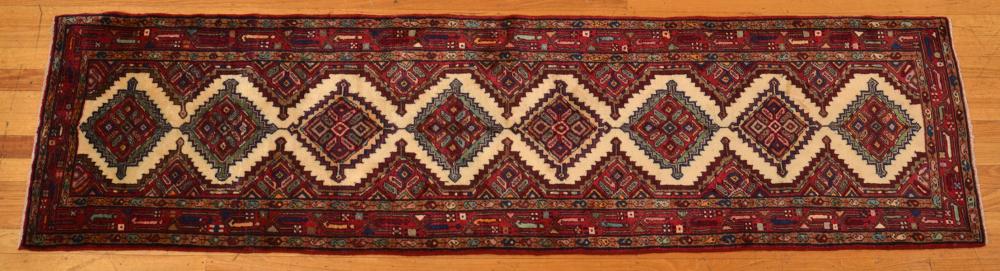 Appraisal: ZAGHEH Hall runner Village weave Caucasian-influenced design of repeating hooked