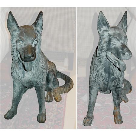 Appraisal: Pair of Cast Iron Figures of German Shepards Estimate -