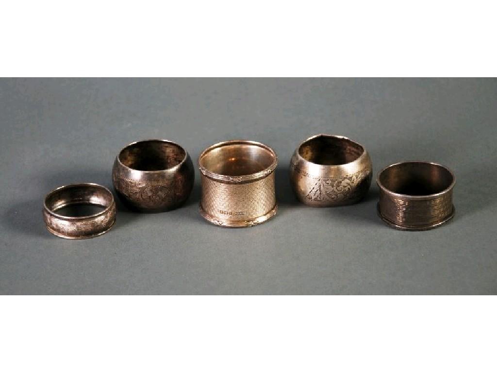 Appraisal: PAIR OF SILVER NAPKIN RINGS circular and cushion sided with