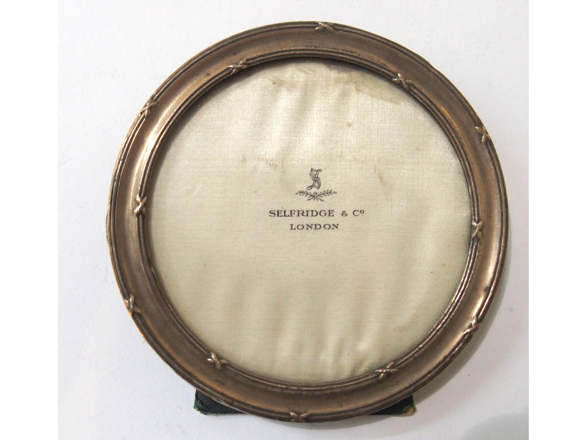 Appraisal: A silver mounted photo frame Birmingham cm diameter