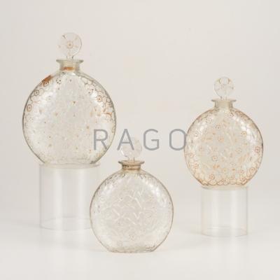 Appraisal: LALIQUE Three Lelys perfume bottles ca All marked R Lalique