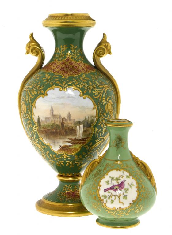 Appraisal: A COALPORT GREEN GROUND VASE with scroll handles painted with