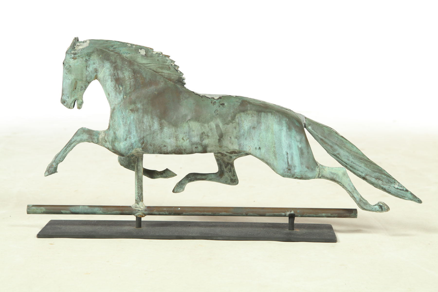 Appraisal: WEATHERVANE American late th century copper Full-bodied running horse with