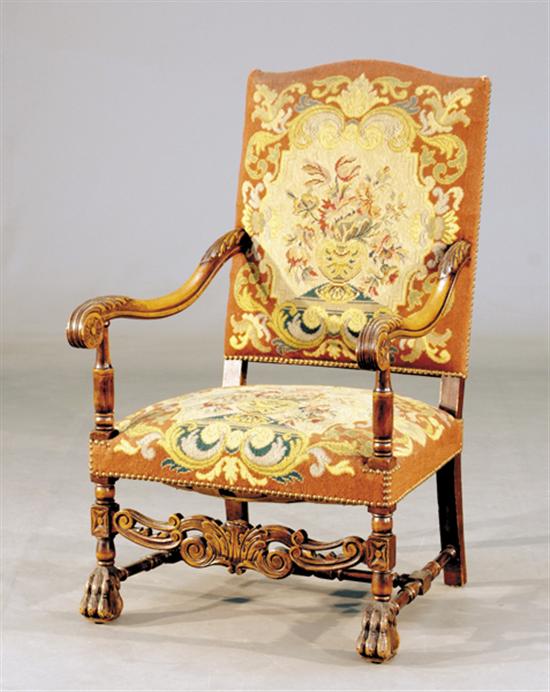 Appraisal: Charles X style carved walnut and tapestry armchair circa domed