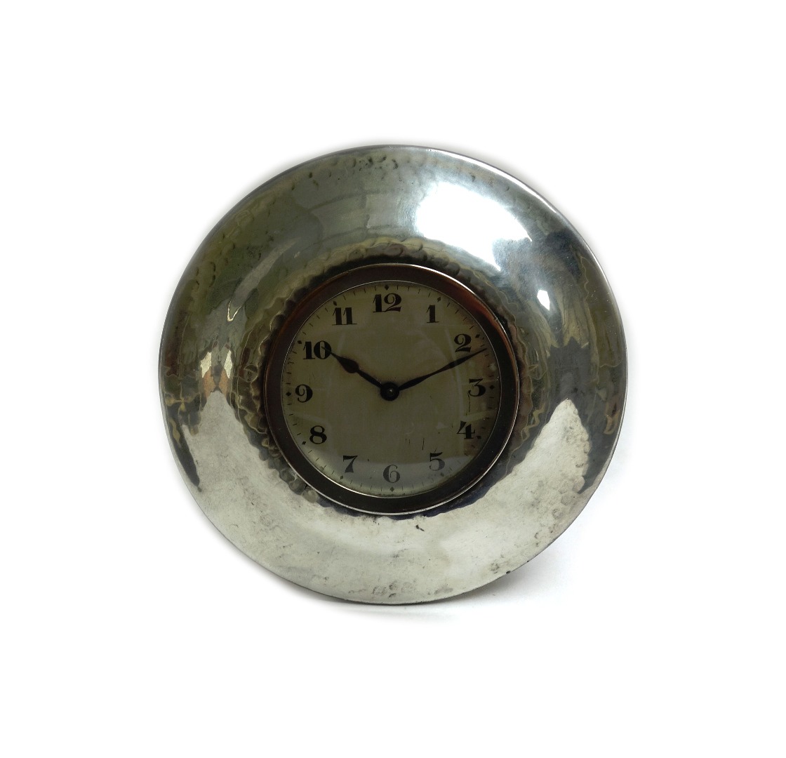 Appraisal: A Liberty Co Tudric pewter desk clock of circular form