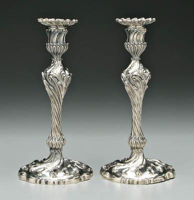 Appraisal: Pair elaborate English silver candlesticks round shaped columns swirl scroll