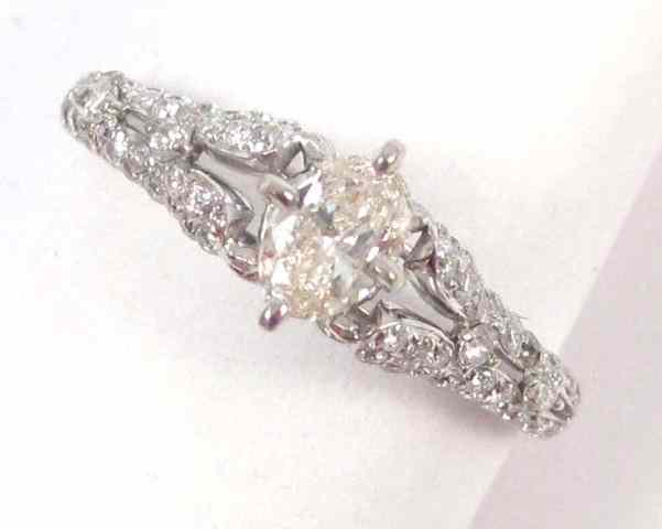 Appraisal: DIAMOND AND EIGHTEEN KARAT GOLD RING white gold featuring an