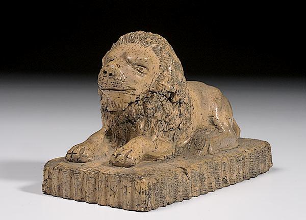 Appraisal: L W CAMP BRICKWORKS RECUMBENT LION DOOR STOP Akron Ohio