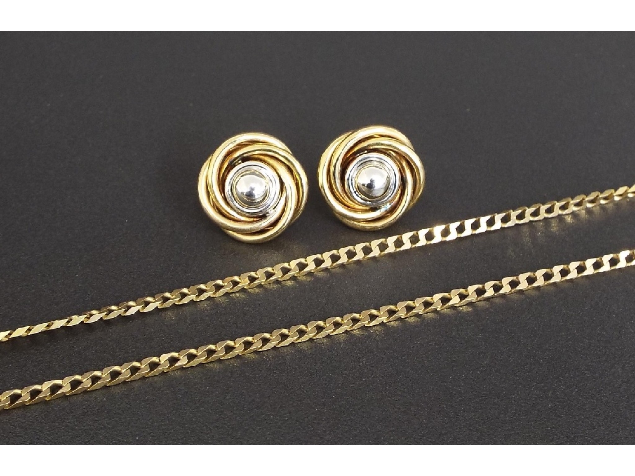 Appraisal: Pair of ct yellow and white gold swirl design earrings