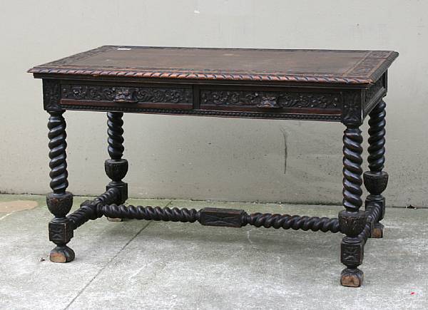 Appraisal: A Baroque style oak library table height in width in