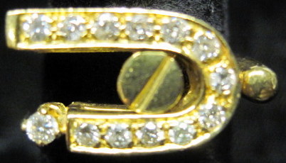 Appraisal: karat yellow gold ring Hurtig'U' shape accented by sixteen petite