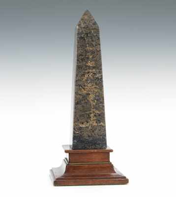 Appraisal: A Polished Stone Obelisk A handsome dark gray tapering obelisk