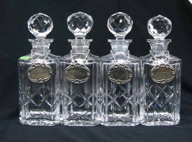 Appraisal: Set of Four Crystal Decanters with stoppers approximately '' to