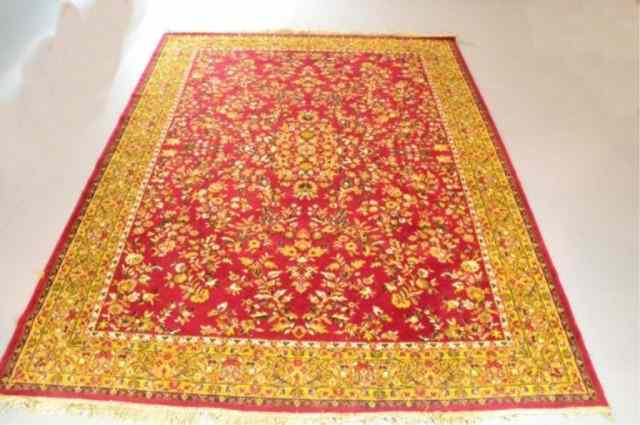 Appraisal: LARGE ORIENTAL CARPETNice central-medallion rug design possible Dozar-style in reds