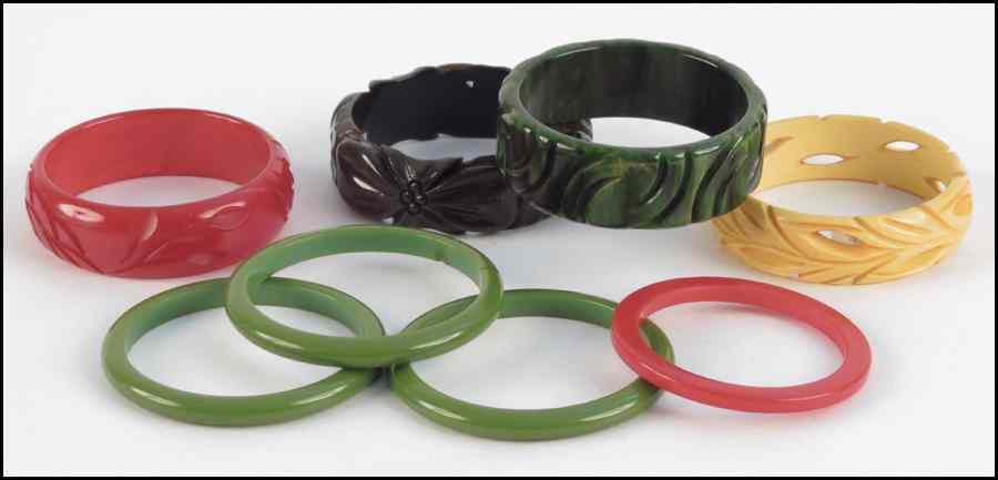 Appraisal: SET OF THREE GREEN BAKELITE BRACELETS Together with two green