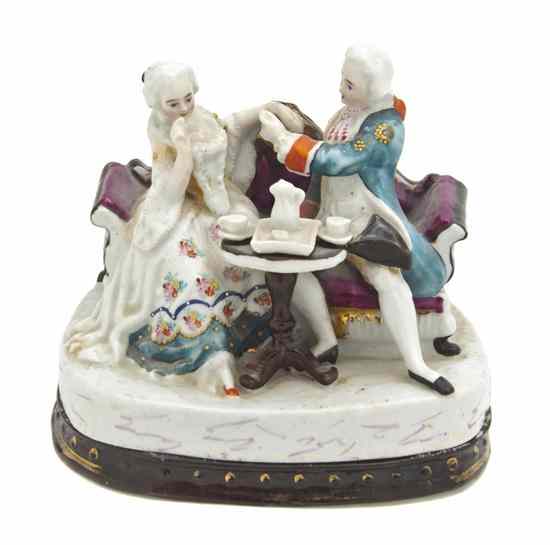 Appraisal: A Staffordshire Figural Inkwell in the form of a seated