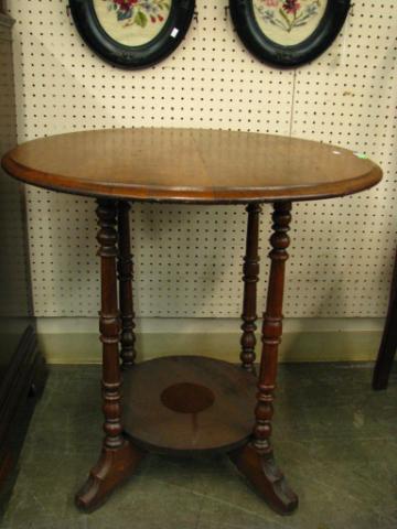 Appraisal: Late Victorian Round Lamp Table with turned legs lower shelf