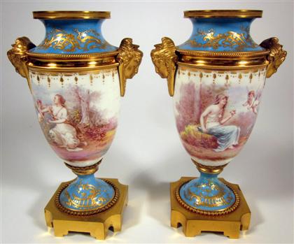 Appraisal: Pair Sevres style turquoise ground porcelain gilt Bronze mounted urnslate