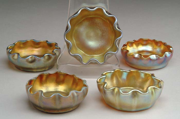 Appraisal: FIVE TIFFANY STUDIOS SALTS Nice lot of Tiffany Favrile salts