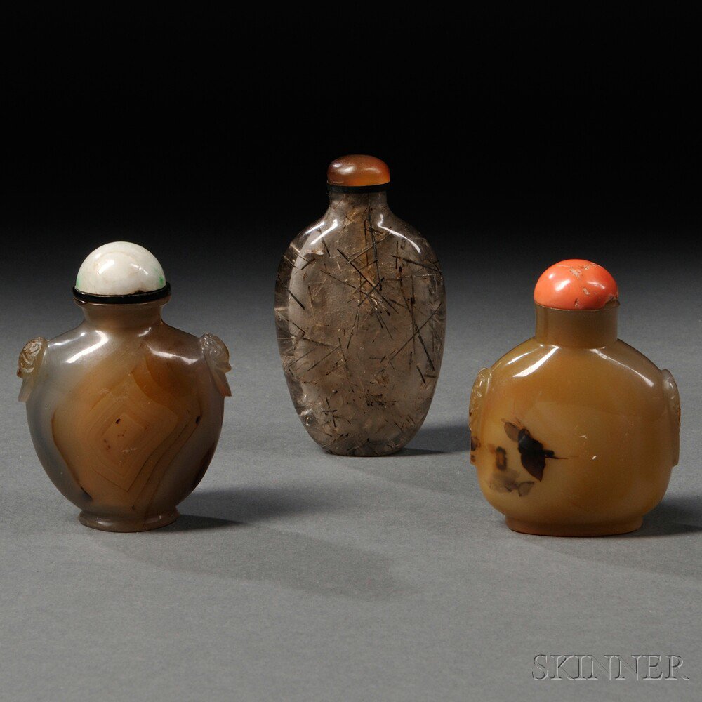 Appraisal: Three Hardstone Snuff Bottles China th th century a oviform