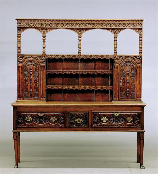 Appraisal: Carved oak Welsh dresser th century dentil-molded cornice and guillouche-carved