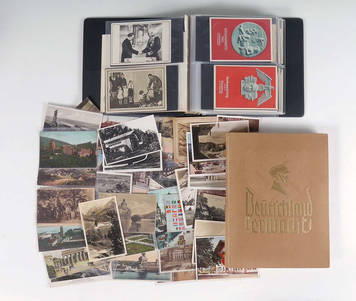 Appraisal: WWII GERMAN ''DEUTSCHLAND ERWACHT'' BOOK POSTCARDS To include book with