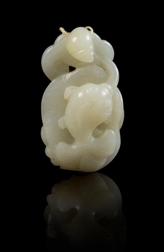 Appraisal: Sale Lot A Carved Jade Toggle the near-white stone depicting