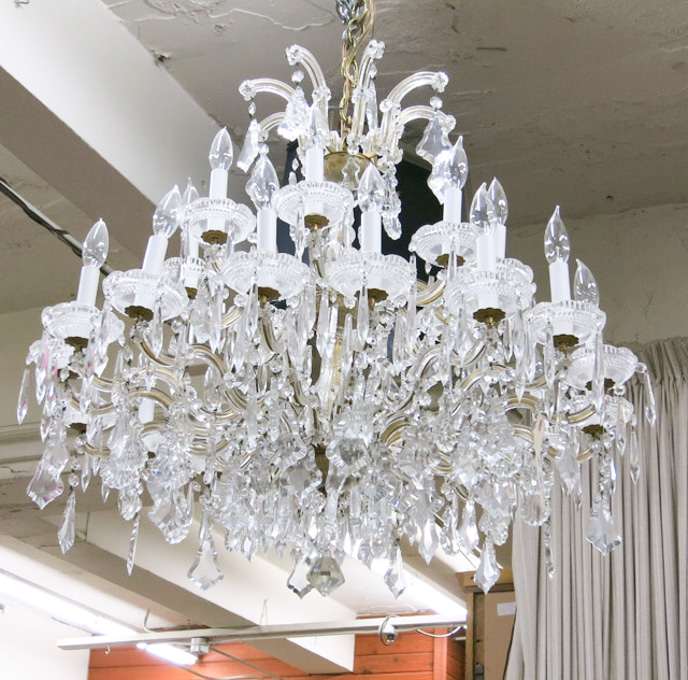 Appraisal: LOUIS XV STYLE CRYSTAL CHANDELIER the candlestick arms arranged in