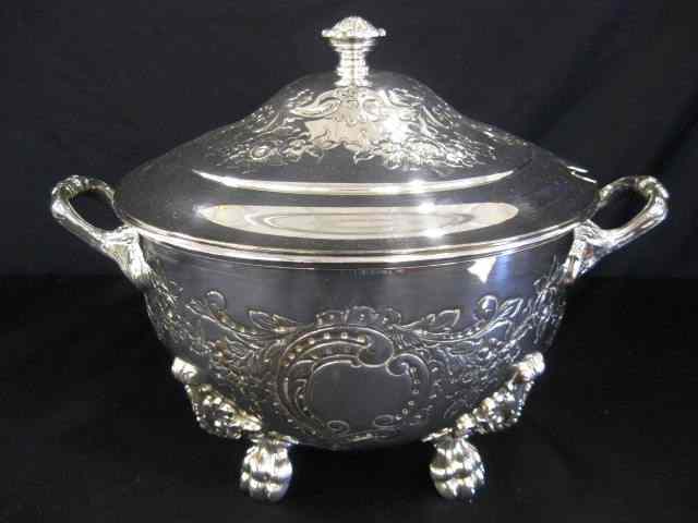 Appraisal: English Silverplate Soup Tureen large lion feet handled handchased floral