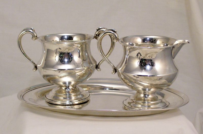 Appraisal: Sterling Creamer Sugar Undertray Sterling lot includes matching creamer and