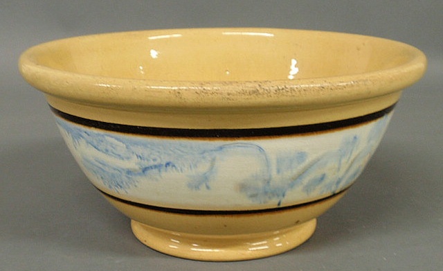 Appraisal: Yellow ware bowl with blue glaze decorated collar h x