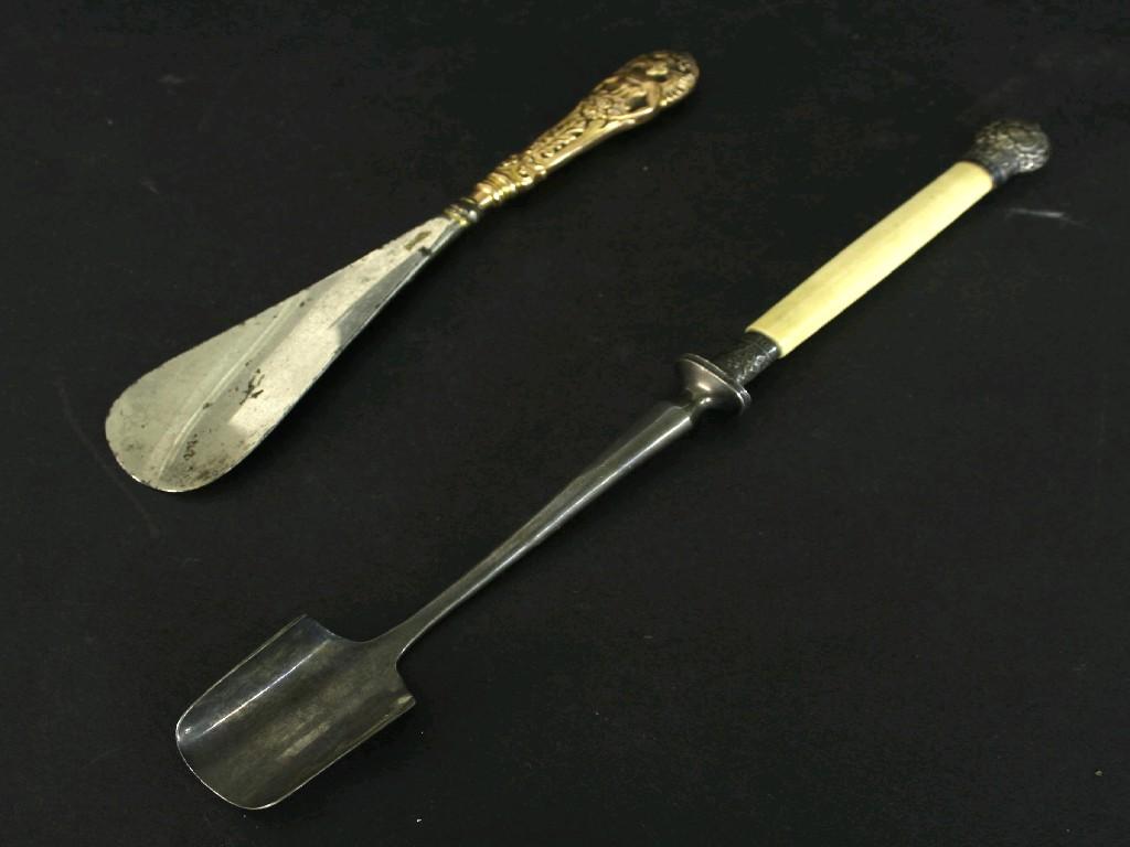 Appraisal: Victorian ivory handled silver stilton scoop with embossed floral silver