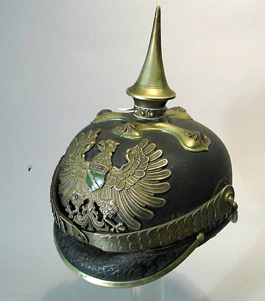 Appraisal: A Prussian Customs officer's pickelhaube The black leather helmet with