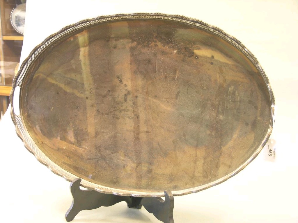 Appraisal: A large silver plated tray oval shape with pierced gallery